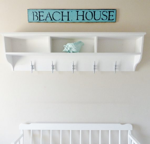 entryway shelf with towel hooks beach house